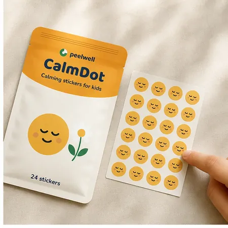 CalmDot patches laid beside the pouch to show size and shape